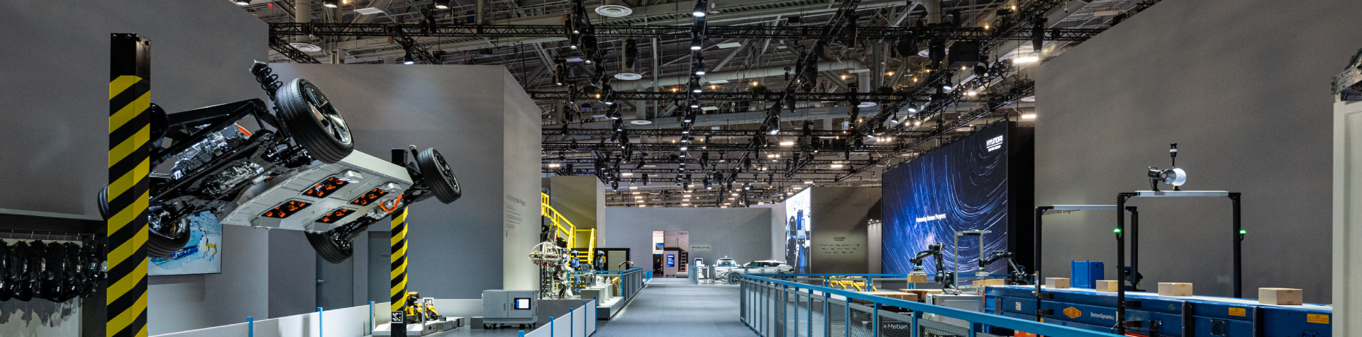 Visitors at the CES 2026 explore an exhibition featuring several of Hyundai’s AI robotics innovations.