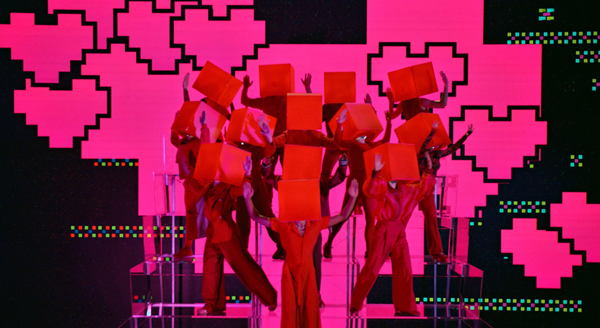 Pixels come together to show a heart emoji, the hallmark of the digital era