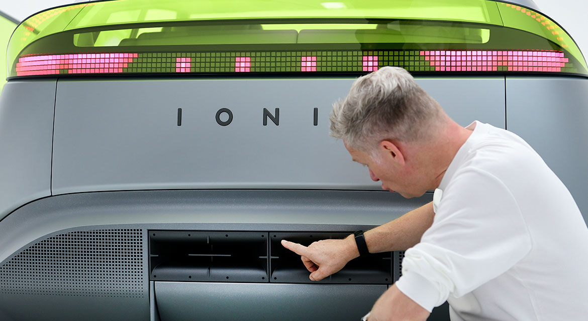 The design team clearly had a lot of fun hiding Mr. Pix in various locations around the Concept THREE. In this image, Simon has just discovered that Mr. Pix screw heads have been used on the rear diffuser. Top attention to detail.