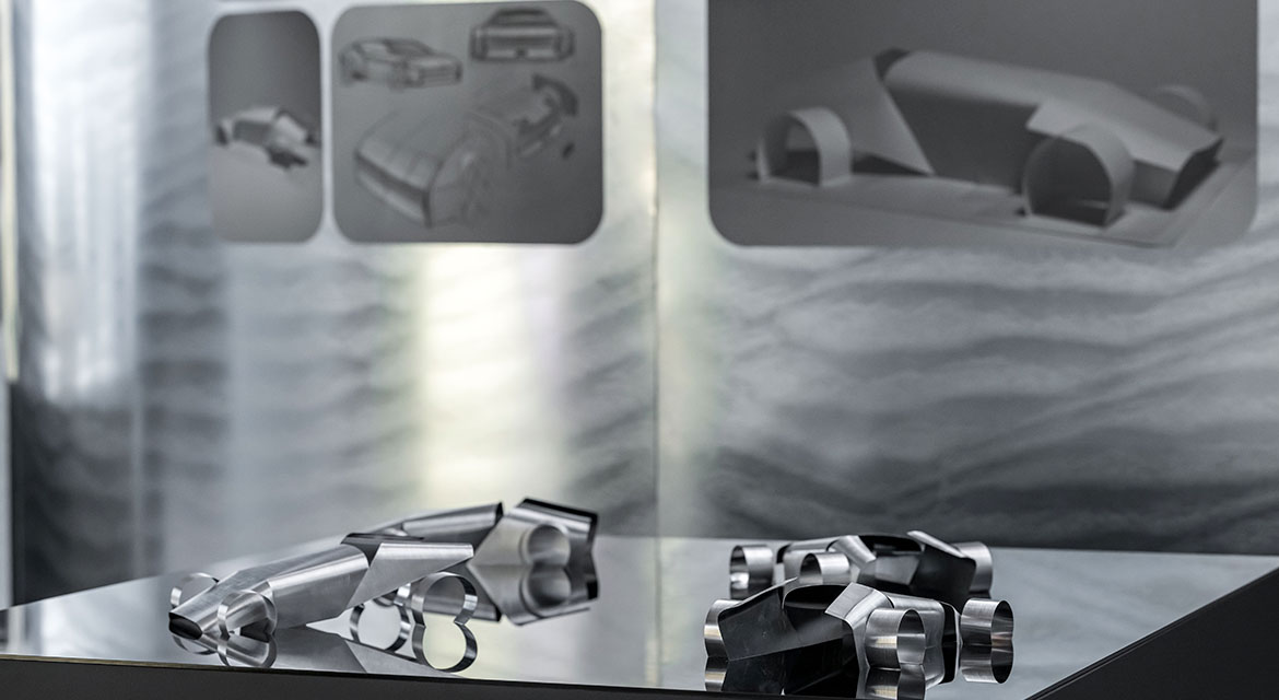 Not only are these steel models beautiful to look at but they allow the designers to study form, tension and flow of the raw material.