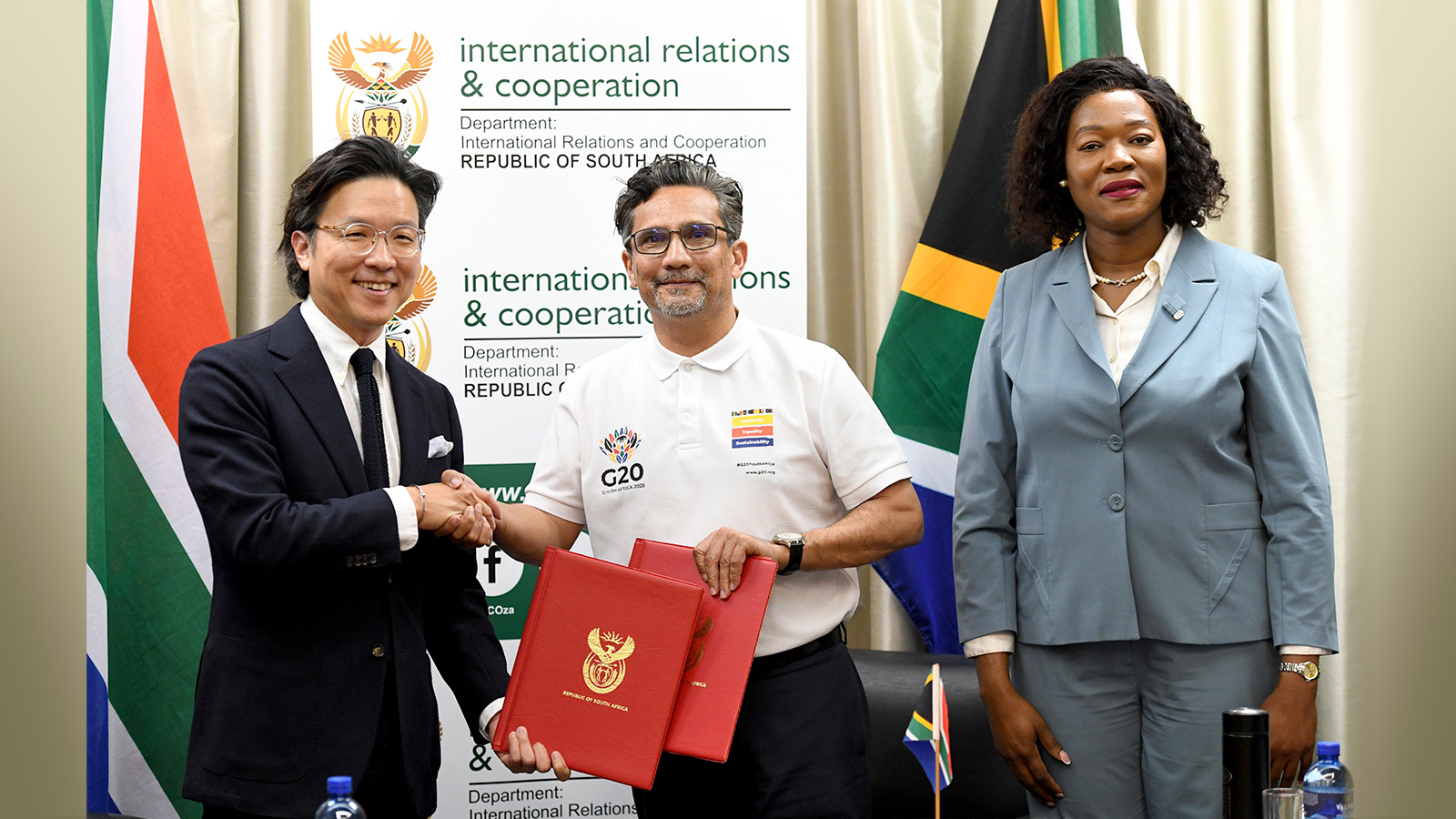 Ilbum Kim, Head of the Global Policy Office at HMG (Left), Zane Dangor, Director-General of DIRCO (middle), and Honorable Anna Thandi Moraka, Deputy Minister of DIRCO (Right) at the MoU signing