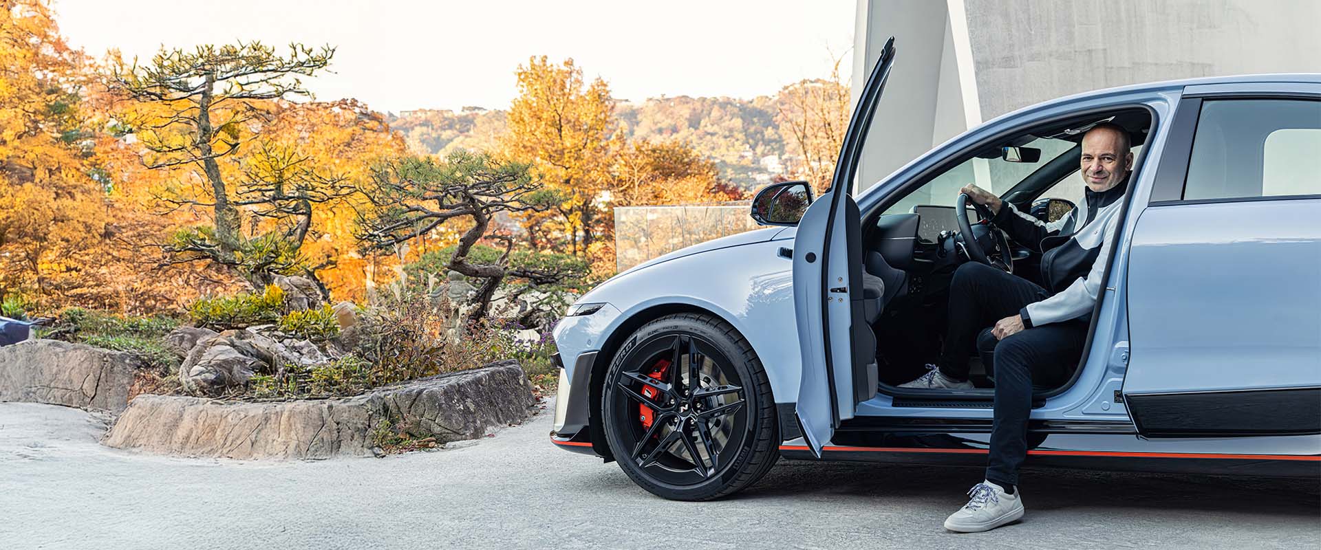 Manfred Harrer behind the wheel of the Hyundai IONIQ 6 N. 