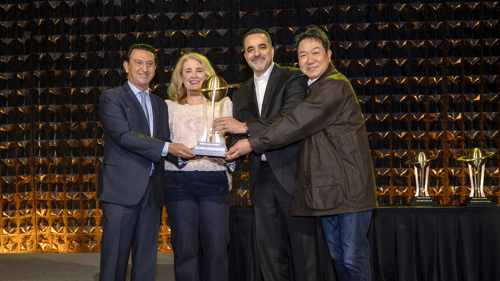 (From left) José Muñoz, President and CEO of Hyundai Motor Company; Jennifer Newman, World Car Awards juror and Editor-in-Chief of Cars.com; Randy Parker, President and CEO of Hyundai Motor North America; and SangYup Lee, Executive Vice President and Head of Hyundai and Genesis Global Design