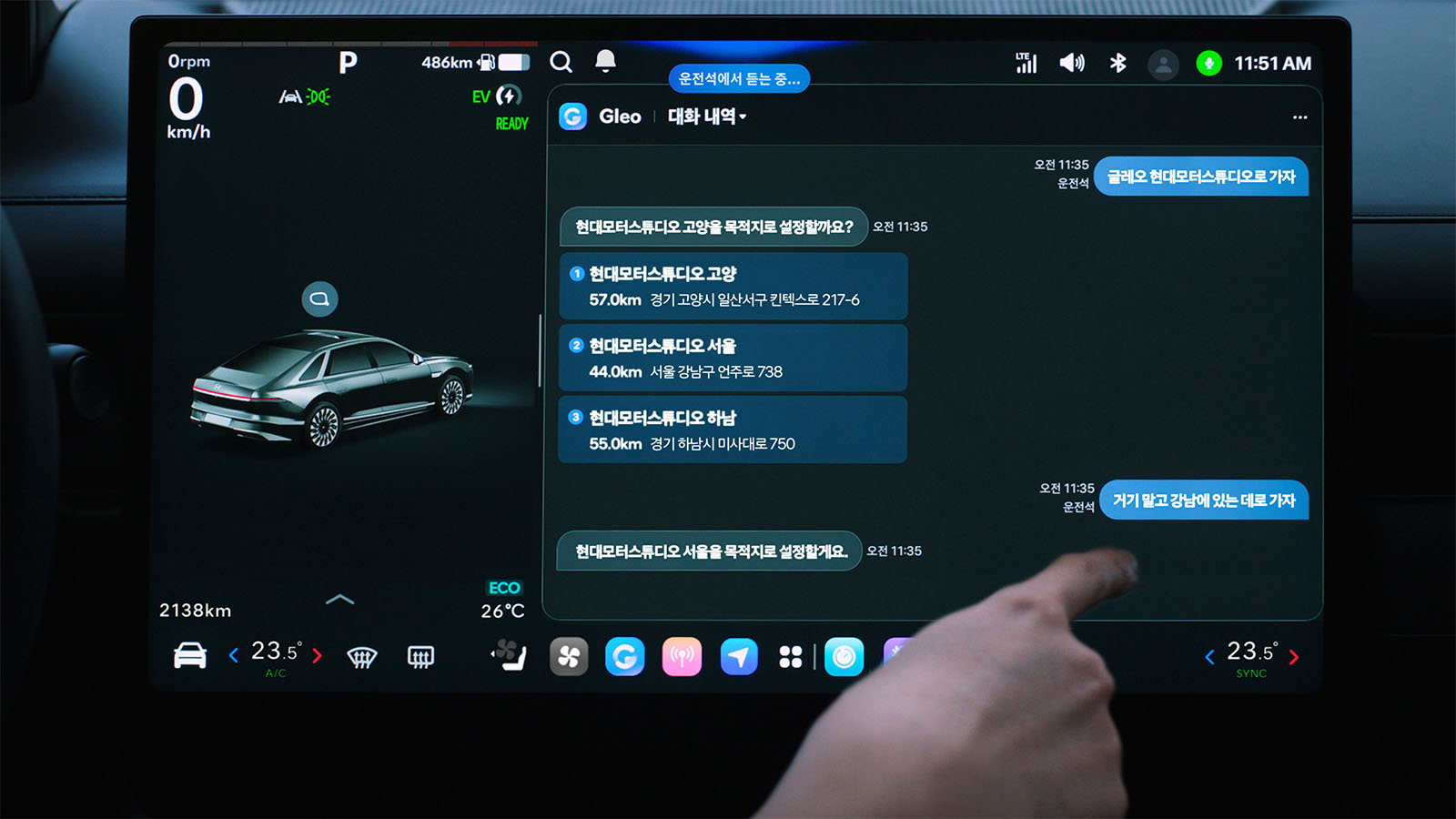 The Gleo AI app running on Pleos Connect. Drivers can activate Gleo AI, the in‑vehicle AI agent, to search for destinations and set routes using voice commands.