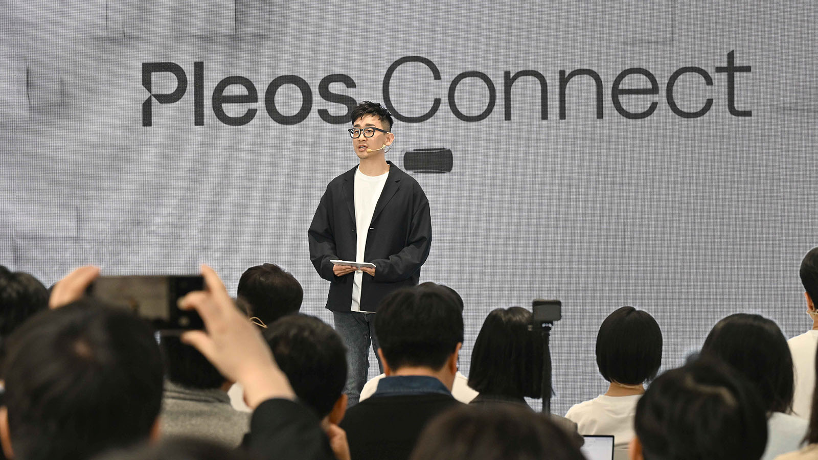 Jongwon Lee, Senior Vice President and Head of the Feature & CCS Sub-Division at Hyundai Motor Group, delivers the opening presentation at the Pleos Connect Media Day.