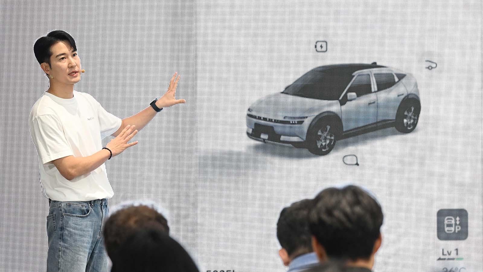 Changsub Kim, Senior Research Engineer, UX Strategy Team at Hyundai Motor Group, presents the user experience (UX) of Pleos Connect at the media day.
